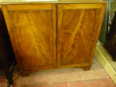 A GEORGIAN MAHOGANY PRESS CUPBOARD TOP recently used as a plan chest with four deep slide-out