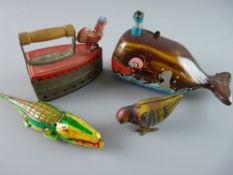 FOUR TINPLATE TOYS to include 'Billy the Ball Blowing Magic Whale' by K O, Japan, 16 cms length, (