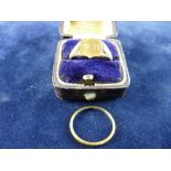 A NINE CARAT GOLD GENT'S SIGNET RING, 4 grms and a narrow unmarked wedding band, 2 grms