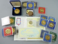 COMMEMORATIVE COINS AND MEDALLIONS to include fourteen, twenty two carat gold plated medallions,