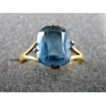 AN EIGHTEEN CARAT GOLD, POSSIBLY TWENTY TWO CARAT, DRESS RING with large oval aquamarine stone, 3.