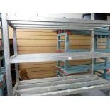 *A STAINLESS STEEL FOUR SHELF STORAGE RACK, 1.2 metres long