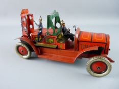 A GUNTHERMANN WIND-UP TINPLATE FIRE ENGINE, well lithographed with two firemen, an SG cord A-13-