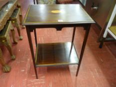 AN EDWARDIAN INLAID MAHOGANY TWO TIER SIDE TABLE having a central Sheraton fan inlay, boxwood