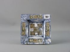 A TROIKA POTTERY SQUARE DISH with a mottled grey blue finish and incised abstract design, marked