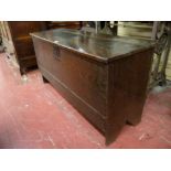 A LATE 18th CENTURY OAK SWORD CHEST, the two plank lid with iron strap hinges and lock plate, iron