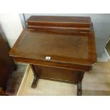 A LATE 19th/EARLY 20th CENTURY DAVENPORT DESK, dark mahogany with triple cubby hole interior