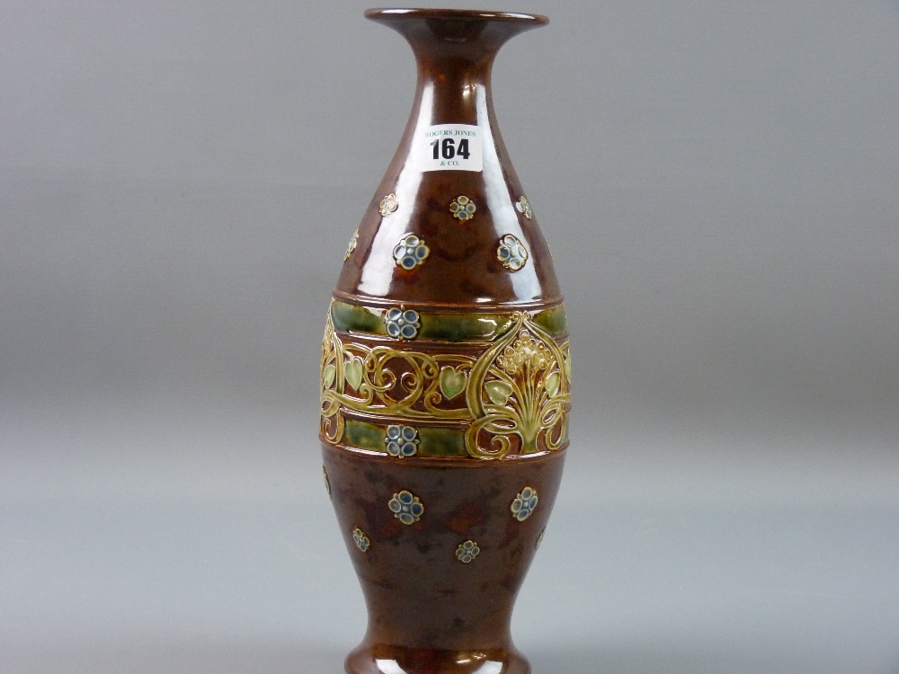 A ROYAL DOULTON HIGH FIRED STONEWARE VASE of baluster form with flared rim, having a floral relief