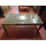 AN INDIAN CARVED HARDWOOD COFFEE TABLE, 20th Century with glass inset top, deep carved bird and leaf