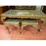 A GOOD SET OF THREE INDIAN CARVED HARDWOOD TABLES, the tops with central oval panels surrounded by