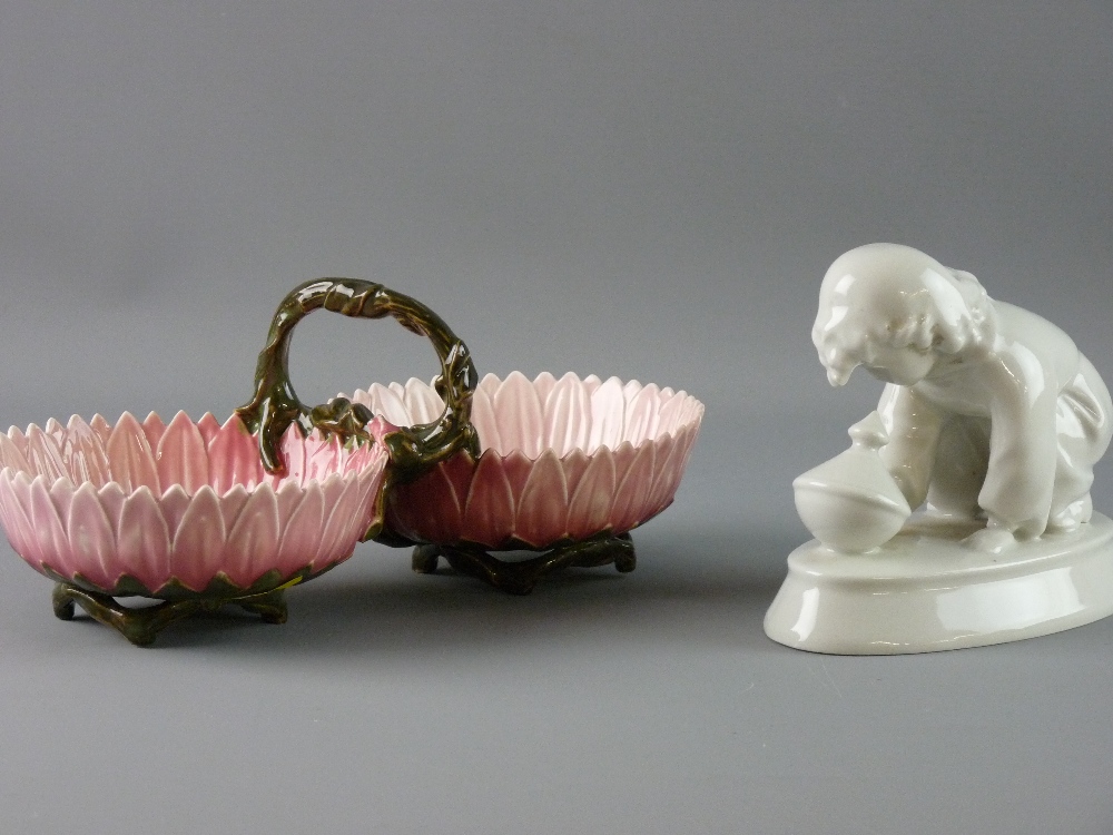 ZSOLNAY CERAMICS to include a white porcelain figure of a young boy crouching by a spinning top on