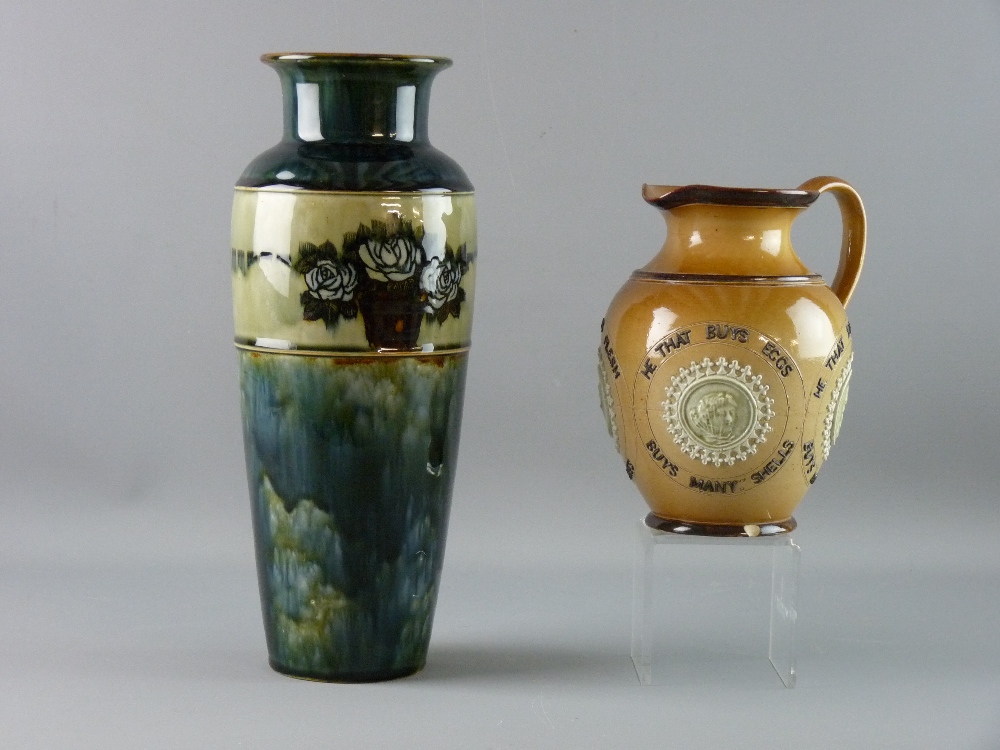 A ROYAL DOULTON STONEWARE VASE AND JUG, the slender baluster shaped vase with flared rim and a