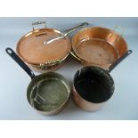 ANTIQUE COPPER COOKING PANS to include a 34 cms diameter seamless pan with foldover rim and brass