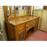A CIRCA 1900 OAK MIRRORBACK SIDEBOARD with inverted block moulded cornice canopy on acanthus