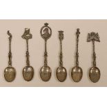 A SET OF SIX DUTCH SILVER SPOONS each with twist stems and engraved heraldic bowls inscribed with