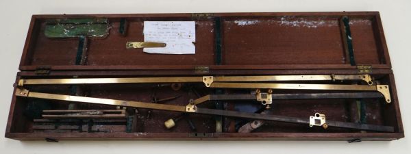 A CASED BRASS EIDOGRAPH, the mechanical plotting instrument inscribed STANLEY, LONDON in a wooden