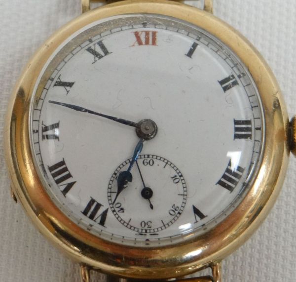 A GENT'S GOLD ENCASED WRISTWATCH in 9ct yellow gold with white enamel dial and non-matching rolled - Image 2 of 2