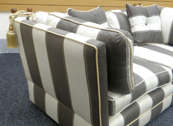 A MODERN KNOWLE SETTEE in striped upholstery and with drop ends - Image 2 of 3