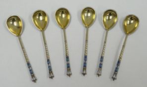 A SET OF SIX RUSSIAN SILVER CHAMPLEVE ENAMEL COFFEE SPOONS with floral and foliate decoration to the