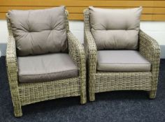 PAIR OF MODERN WICKER CONSERVATORY ARM CHAIRS with loose cushions