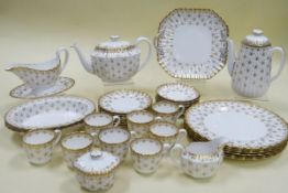 A SPODE 'FLEUR DE LYS - GOLD' DINNER-SET, 39 pieces including coffee and teapot