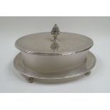 VICTORIAN SILVER & GLASS BUTTER DISH of oval form, the base raised on four feet to stand the frosted