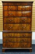 A MAHOGANY CHEST-ON-CHEST the base with three graduated long drawers below a baize lined slide,