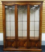 FINE QUALITY REPRODUX CABINET in the Edwardian style mahogany and having two long glazed doors