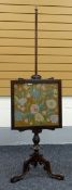 A POLE SCREEN WITH FLORAL EMBROIDERY the embroidery in a square mahogany frame and on a carved