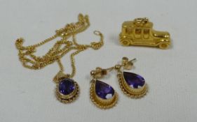 A GOLD MOTOR CAR CHARM & AMETHYST NECKLACE & EARRINGS, the charm seemingly unmarked, 13.6gms