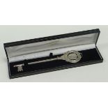 A SILVER PRESENTATION KEY inscribed 'Presented to John Jones Esq, Chairman of the council on the