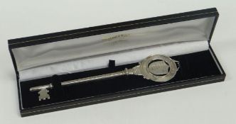 A SILVER PRESENTATION KEY inscribed 'Presented to John Jones Esq, Chairman of the council on the