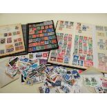 STAMP ALBUMS & LOOSE STOCK comprising thinly-filled blue Lancaster album with Victoria page,