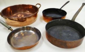 FOUR ITEMS OF ANTIQUE COPPER KITCHEN-WARE being a cheese pan with elevated handles, 41cms diam,