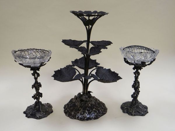 AN EPNS NATURALISTIC TABLE-CENTRE PIECE with six outward leaf-form dishes and a centre trumpet-top