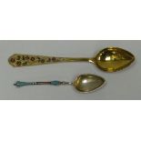 A RUSSIAN SILVER GILT & ENAMEL COFFEE SPOON the handle with a vine of enamelled flowers and leaves