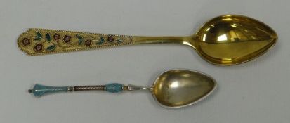 A RUSSIAN SILVER GILT & ENAMEL COFFEE SPOON the handle with a vine of enamelled flowers and leaves