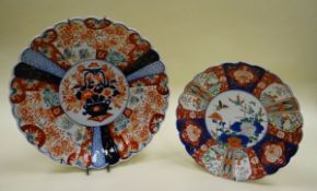 TWO IMARI CHARGERS both of similar fanned form with typical decoration, 41cms and 31cms diam