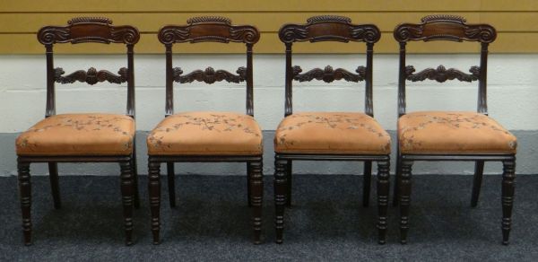 SET OF FOUR DRAWING-ROOM CHAIRS with decorative rails and acanthus back-stretchers on turned