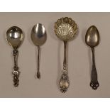 FOUR CONTINENTAL SILVER SPOONS each with a variety of designed handles and terminals including a