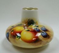 A ROYAL WORCESTER ONION SHAPED VASE with painted fruit, signed Roberts, 7cms high