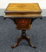 VICTORIAN ROSEWOOD WORK-TABLE having a hinged lid to reveal a compartmented interior above a
