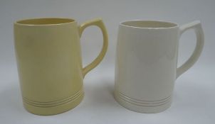 A PAIR OF KEITH MURRAY DESIGN TANKARDS FOR WEDGWOOD, 13cms high