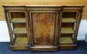 A VICTORIAN WALNUT BREAKFRONT CREDENZA composed of two flanking cabinets to the centre cupboard