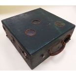 A DEVRY CHICAGO MOTION PICTURE PORTABLE PROJECTOR in a green leather effect case Provenance: from