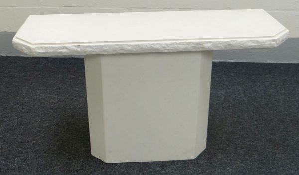 A MODERN FAUX-MARBLE SIDE TABLE on a single pedestal base of plain form, 133cms wide