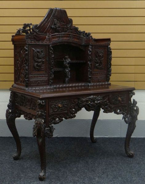 A JAPANESE MEIJI CARVED DESK with cabinet and recess top and base of two drawers, heavily carved - Image 4 of 6