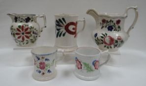 A PARCEL OF WELSH POTTERY comprising large floral jug, smaller jug and three mugs, all with