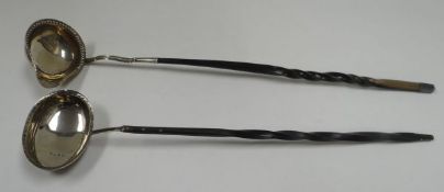 TWO SILVER & BALEEN TODDY LADLES both with twist-handles, one marked London 1813, other unmarked