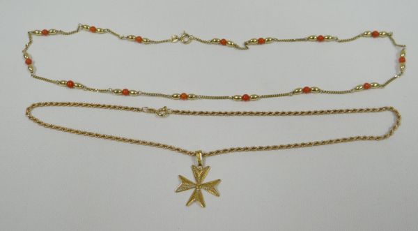 TWO 9CT YELLOW GOLD NECKLACES one with pink coral beads, 7.8gms the other with star pendant, 6.9gms